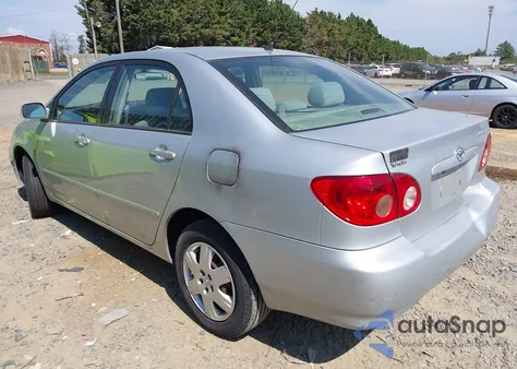 2005 Toyota Corolla Le z USA, uszkodzony, nr VIN 2T1BR32E15C552418